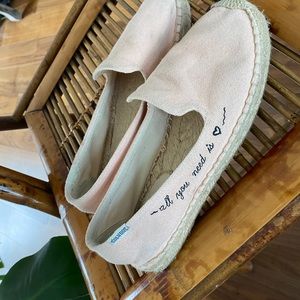 Soludos used “all you need is love” shoes. Worn a handful of time. Size 7